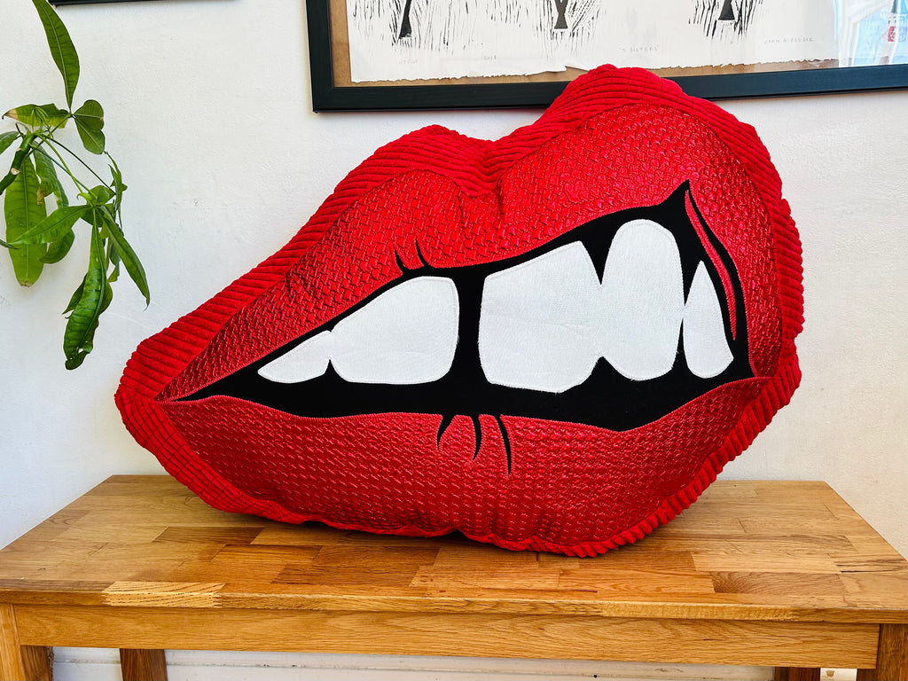 One Off Supersized Bite Back Cushion - Pink and Red with braces